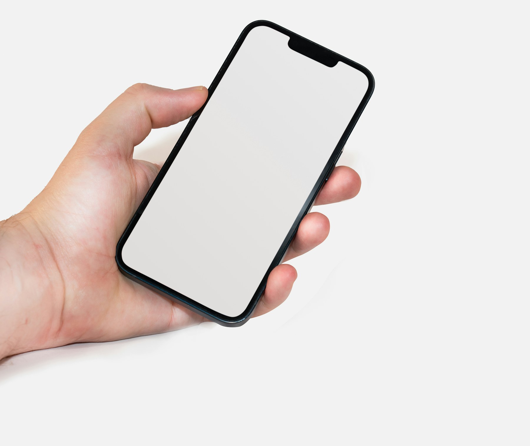 A phone held in one hand, ready for someone else to use